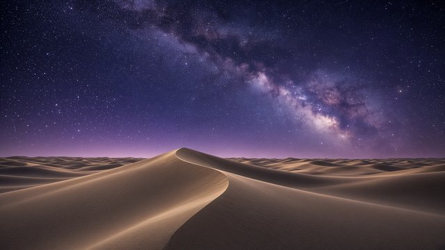 Smooth sand dune ridges under a brilliant Milky Way arc with a faint purple glow on the horizon, original AI nature wallpaper
